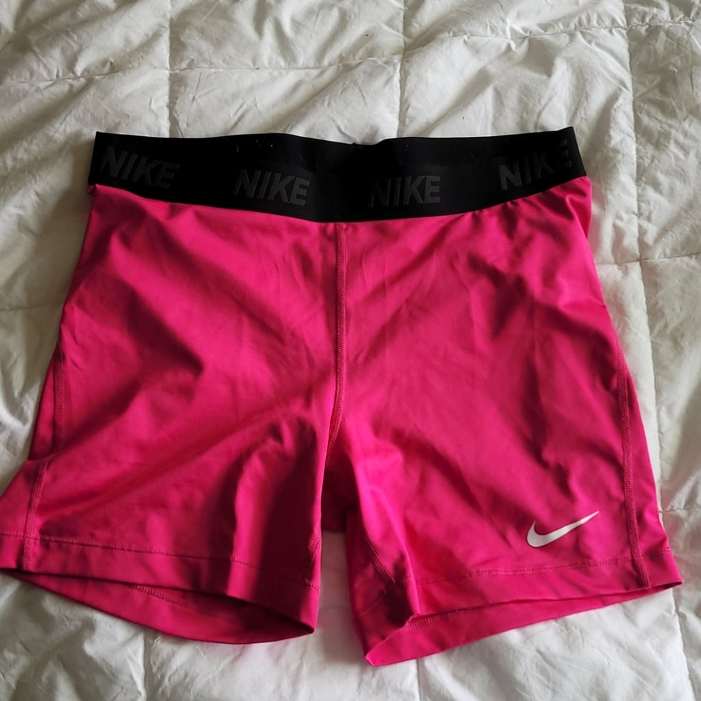 Hot pink Nike running shorts